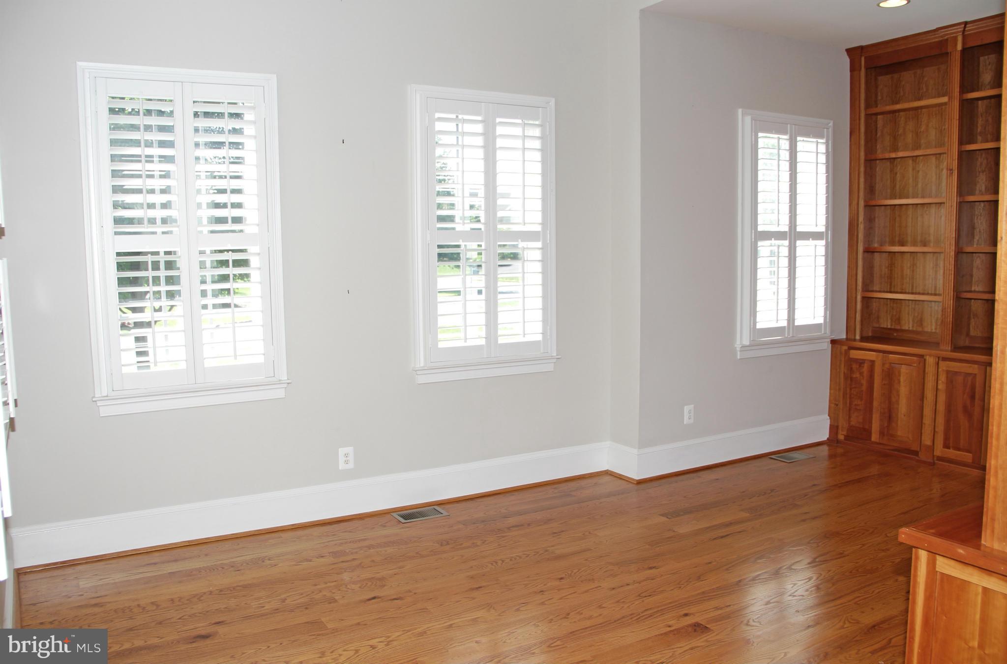8288 Roxborough Loop Gainesville, VA 20155 - Photo 16 of 30 Main Level Study off Foyer with Built-ins Galore