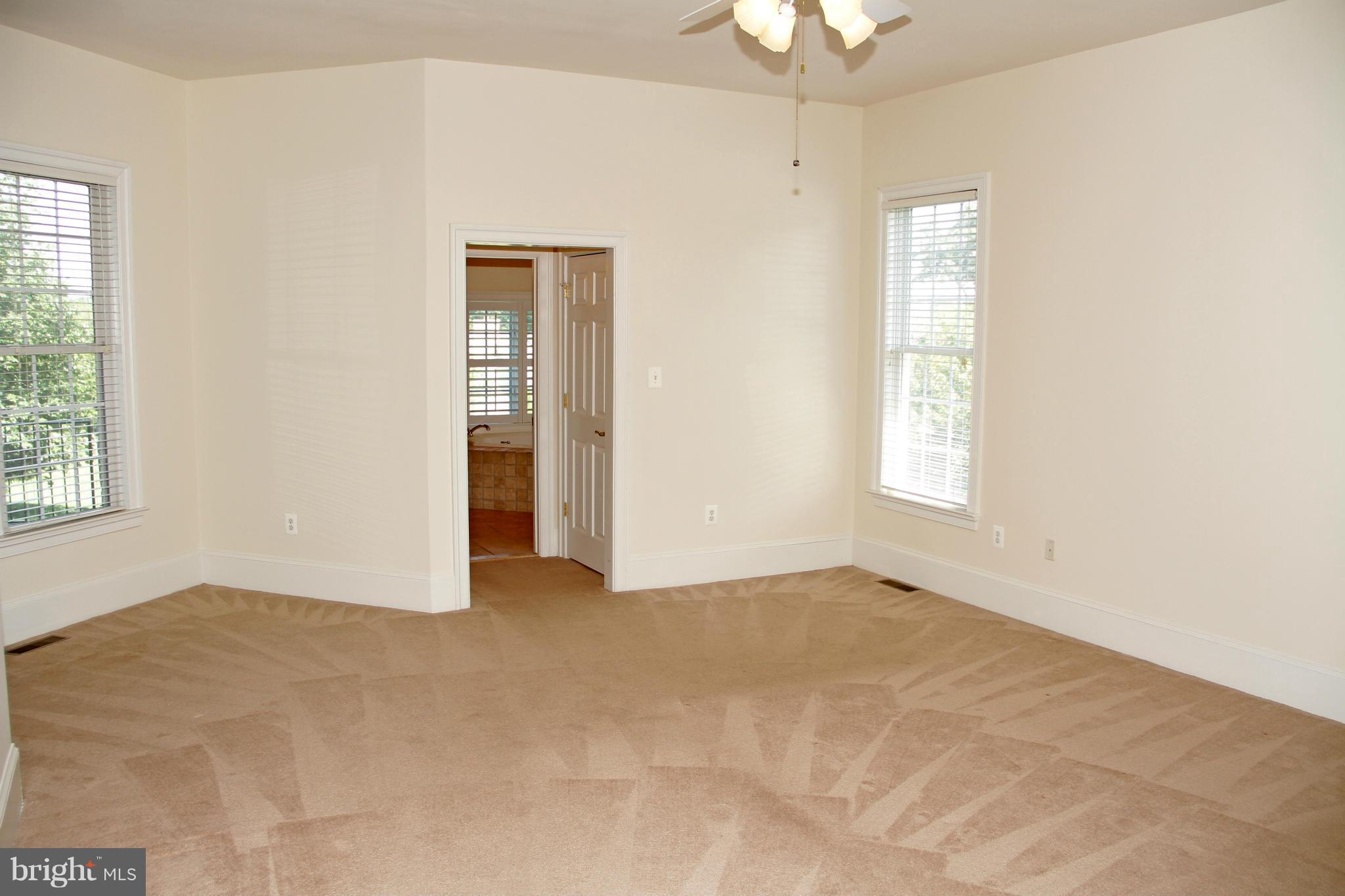 8288 Roxborough Loop Gainesville, VA 20155 - Photo 17 of 30 Bright Main Level Master Suite