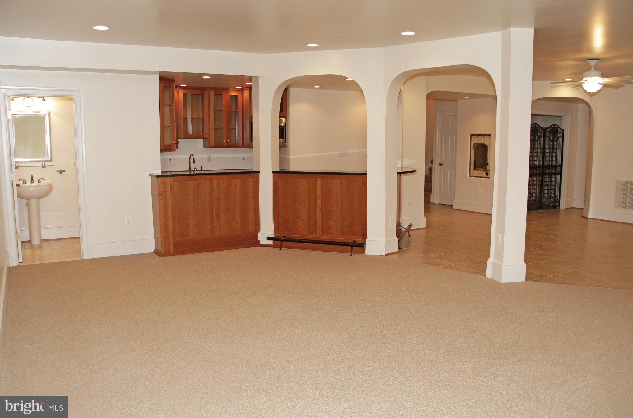 8288 Roxborough Loop Gainesville, VA 20155 - Photo 25 of 30 Great Custom Bar with Granite and Stainless