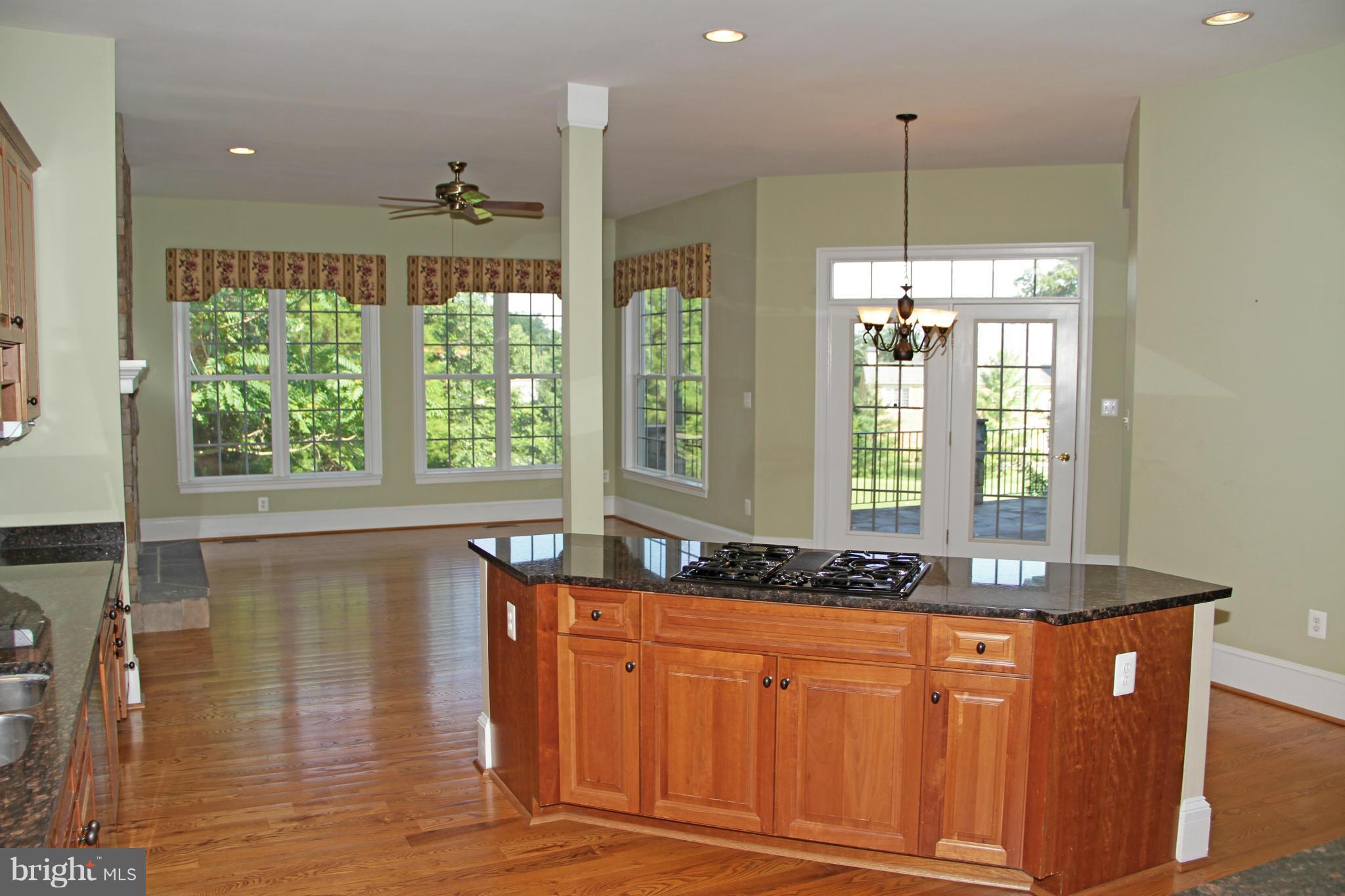 8288 Roxborough Loop Gainesville, VA 20155 - Photo 9 of 30 French Doors to Covered Stone Terrace