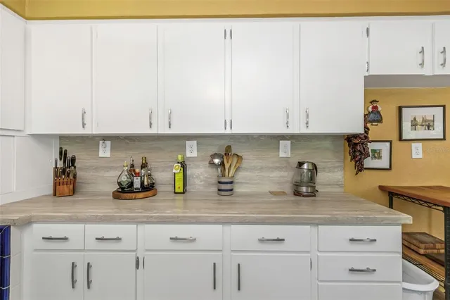 a bedroom with furniture and a bed