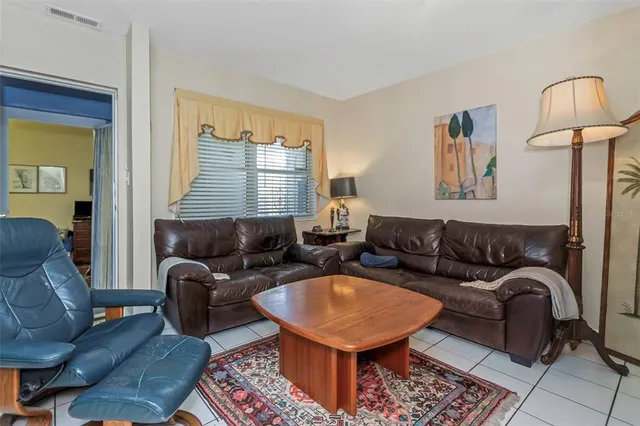 a bathroom with a sink mirror and toilet