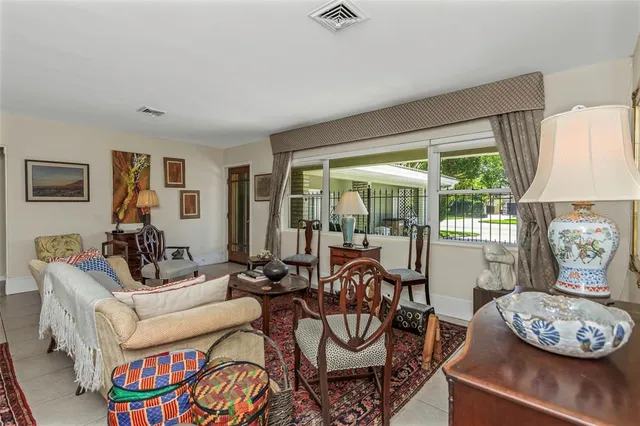 a living room with furniture and a window