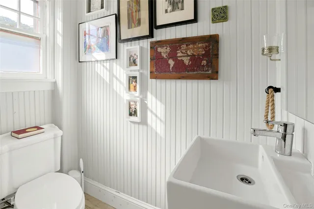 a bathroom with a sink and a toilet