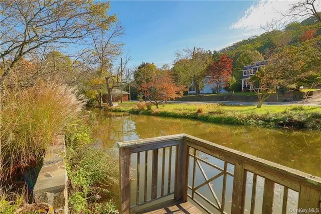 a view of a balcony with ocean view