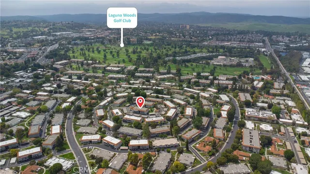 a childrens park with lots of swings and slides