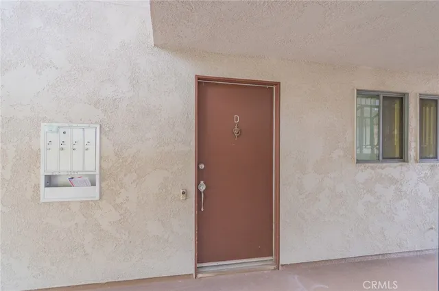 a view of a hallway with elevator