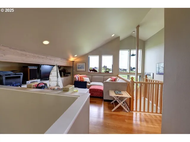 a living room with lots of furniture and a view of living room