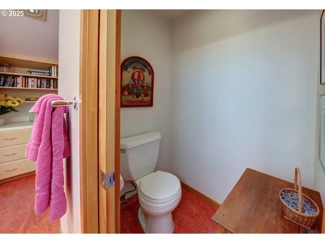 a bathroom with a toilet and a sink