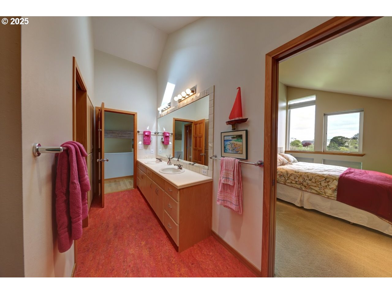 500 Farrell Court Seaside, OR 97138 - Photo 34 of 39 a living room with kitchen island granite countertop furniture and a flat screen tv