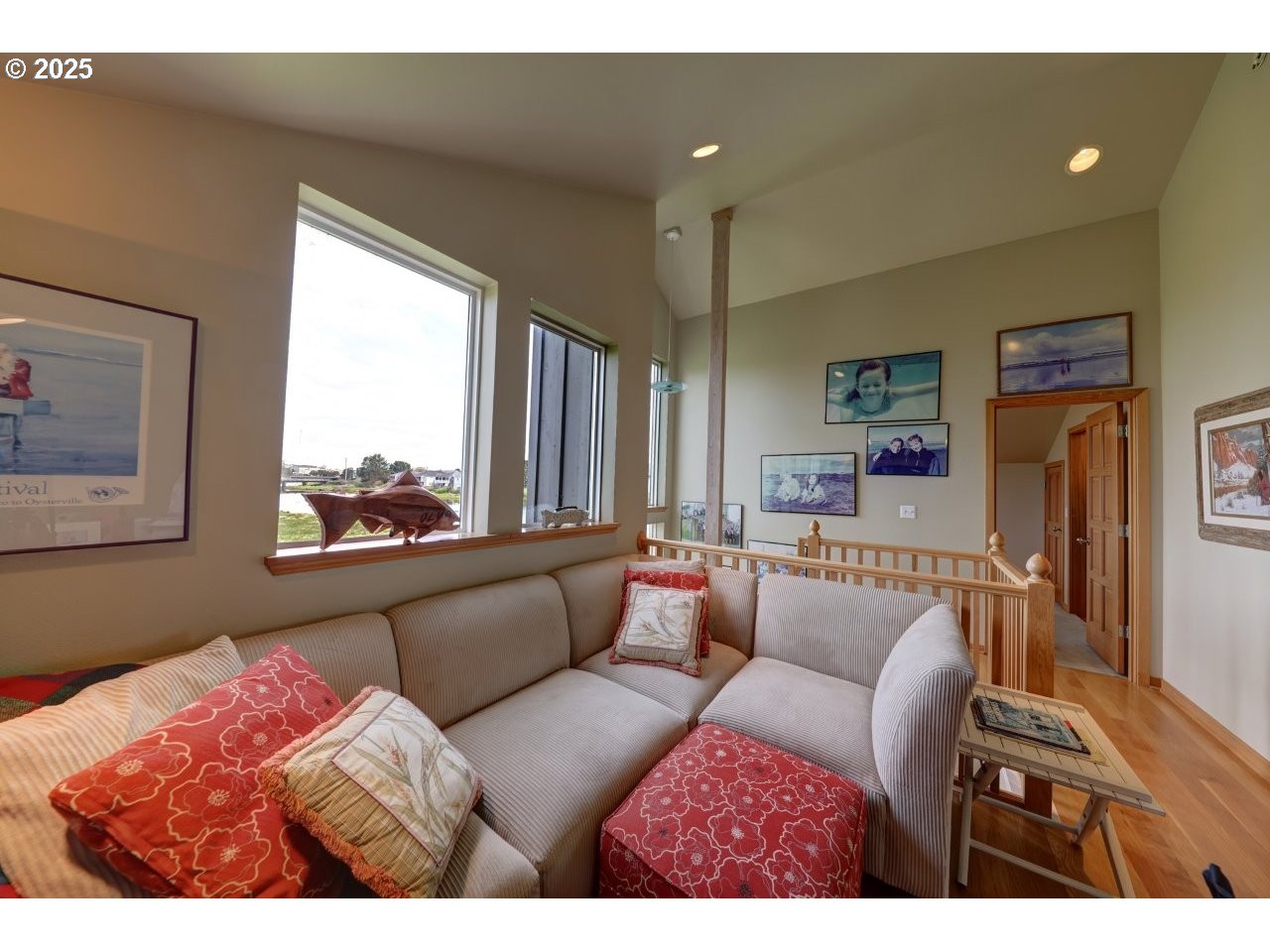 500 Farrell Court Seaside, OR 97138 - Photo 36 of 39 a living room with furniture and a large window