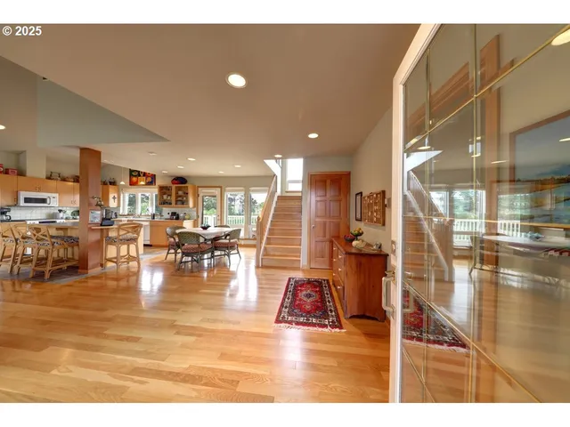 a living room with lots of furniture and a view of living room