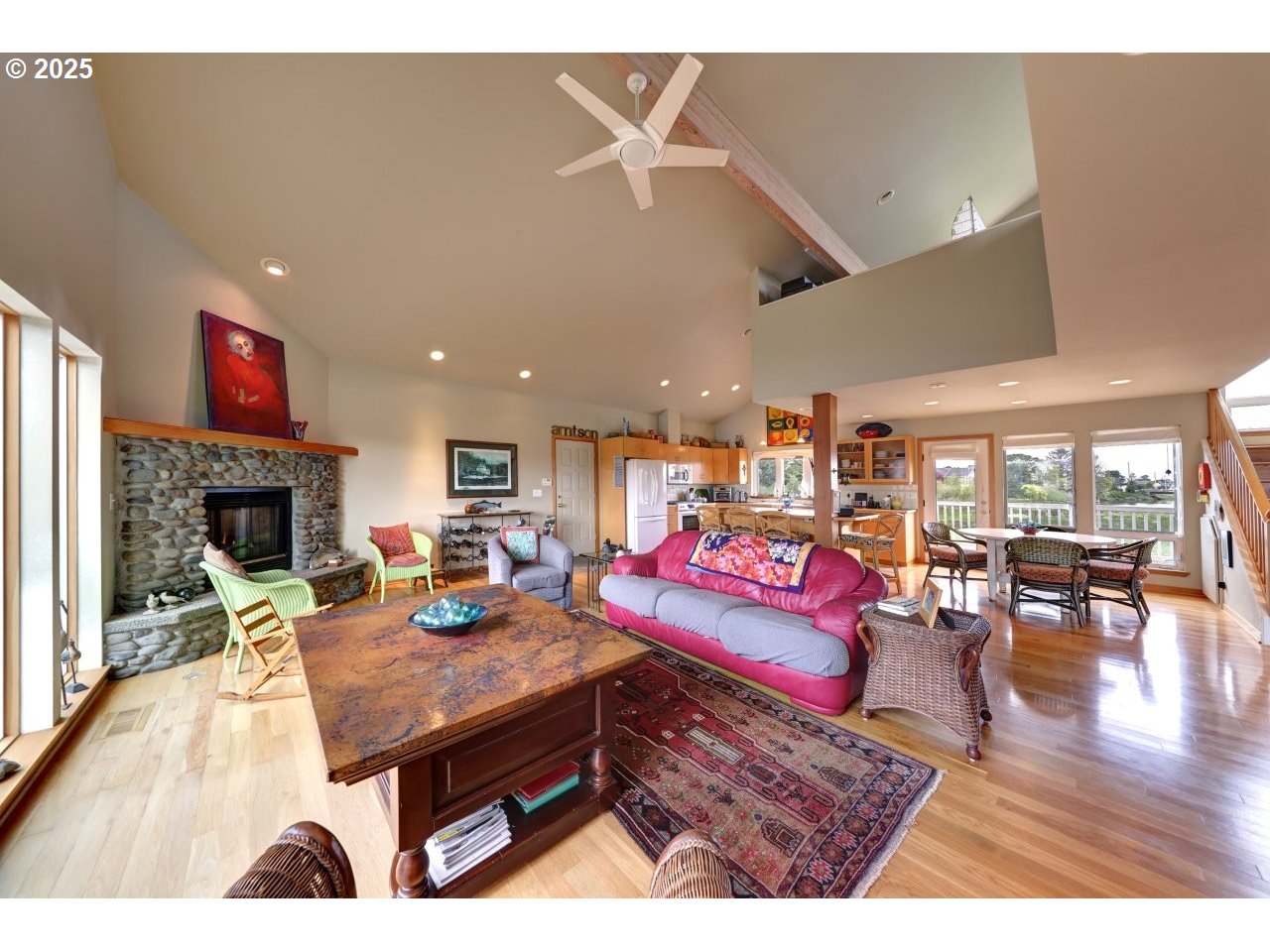 500 Farrell Court Seaside, OR 97138 - Photo 9 of 39 a living room with furniture and a fireplace
