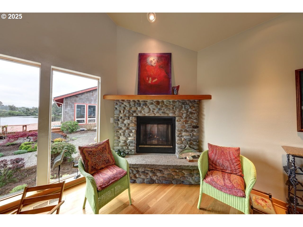 500 Farrell Court Seaside, OR 97138 - Photo 10 of 39 a living room with furniture and a fireplace