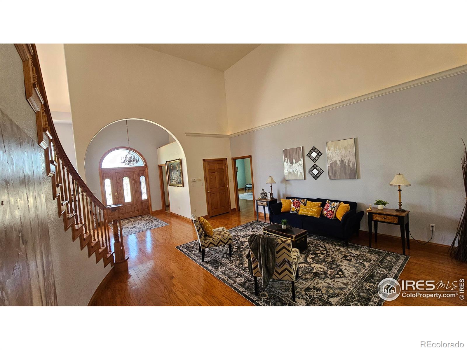 17606 County Rd Q.8 Fort Morgan, CO 80701 - Photo 2 of 37 a living room with furniture and a wooden floor