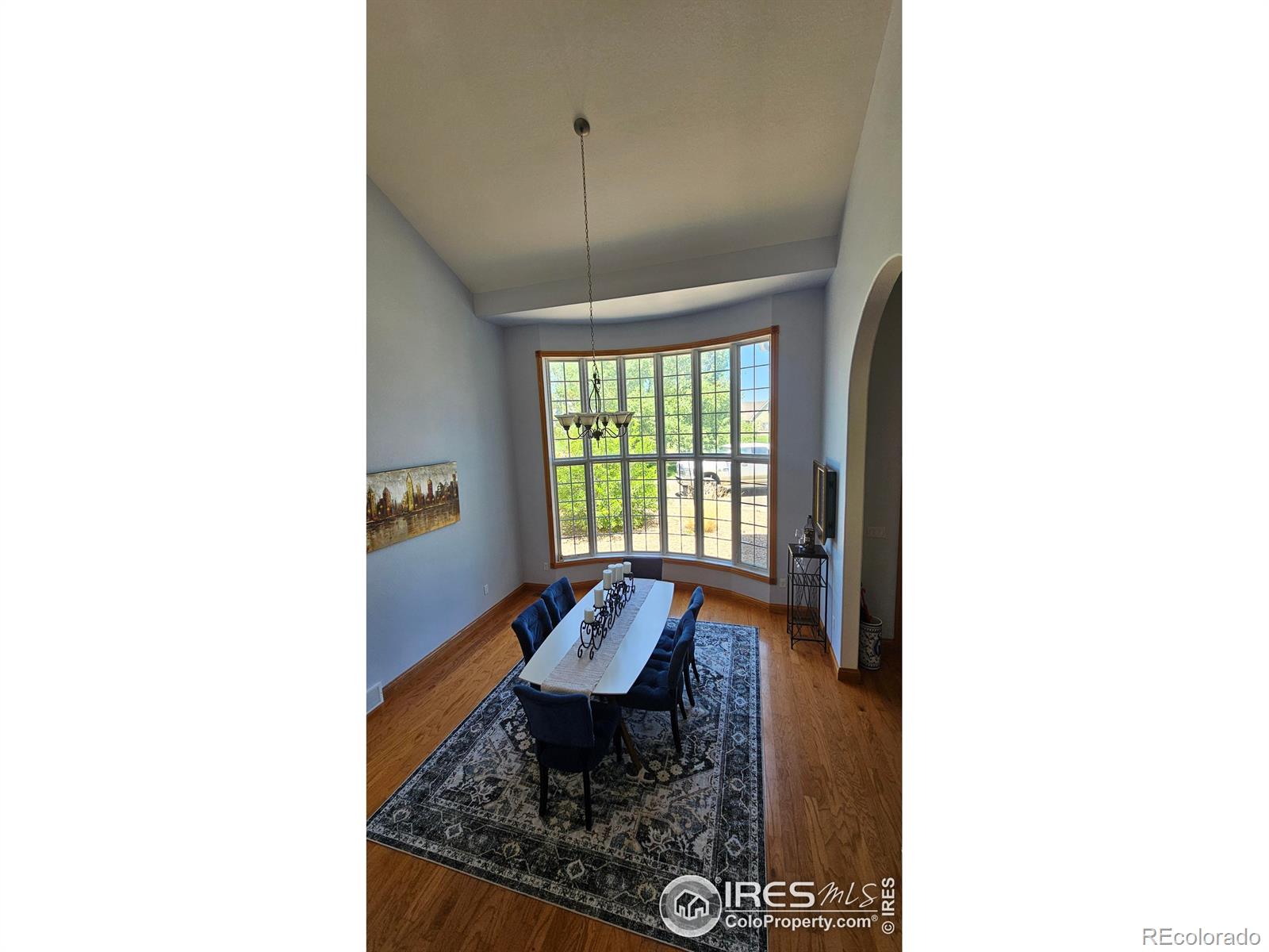 17606 County Rd Q.8 Fort Morgan, CO 80701 - Photo 6 of 37 a living room with a table and a window