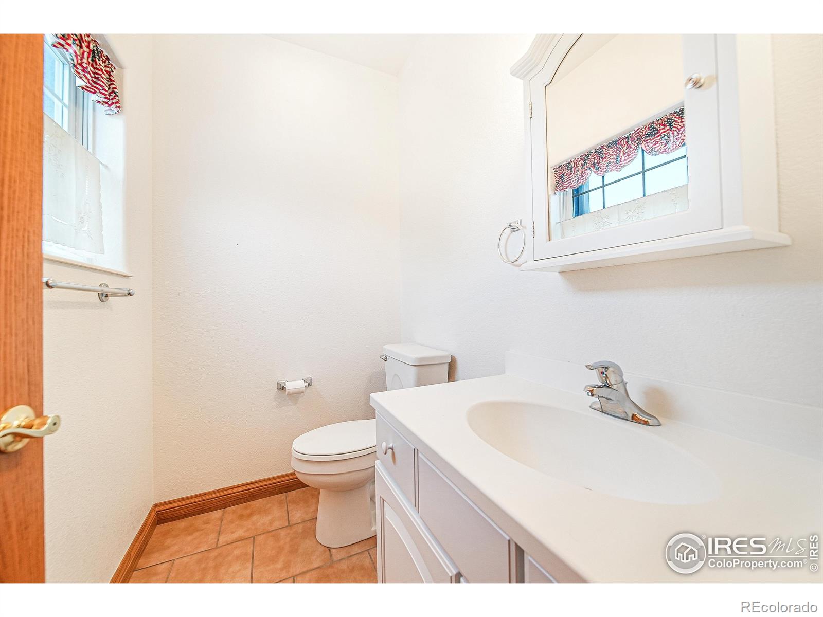 17606 County Rd Q.8 Fort Morgan, CO 80701 - Photo 8 of 37 a bathroom with a sink and a toilet