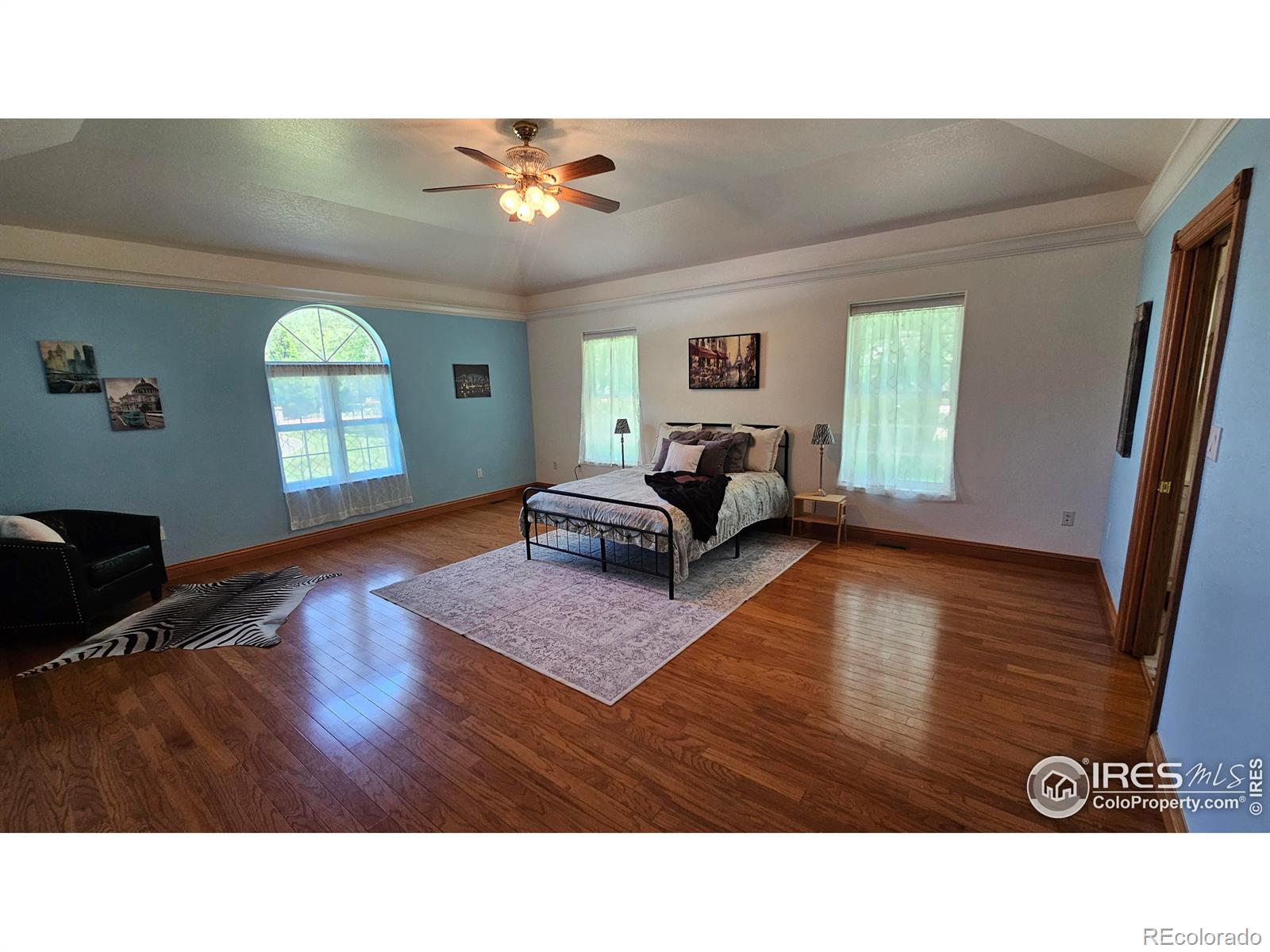 17606 County Rd Q.8 Fort Morgan, CO 80701 - Photo 10 of 37 a living room with furniture and a large window