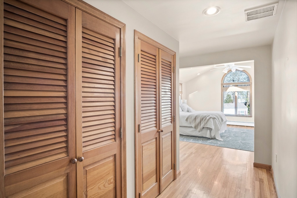 8 Grace Road Woburn, MA 01801 - Photo 18 of 37 a view of a bedroom with a bed and a window