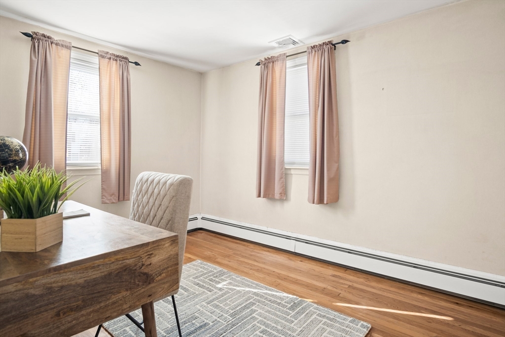 8 Grace Road Woburn, MA 01801 - Photo 21 of 37 a view of a room with a window and wooden floor