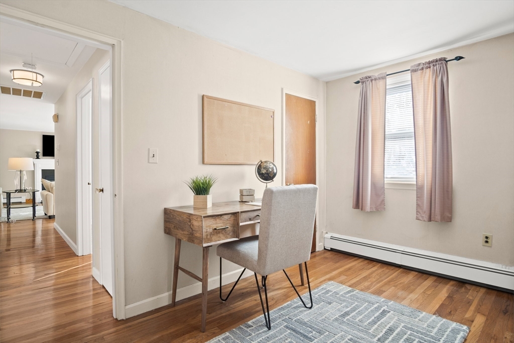 8 Grace Road Woburn, MA 01801 - Photo 22 of 37 a view of a dining room with furniture window and wooden floor