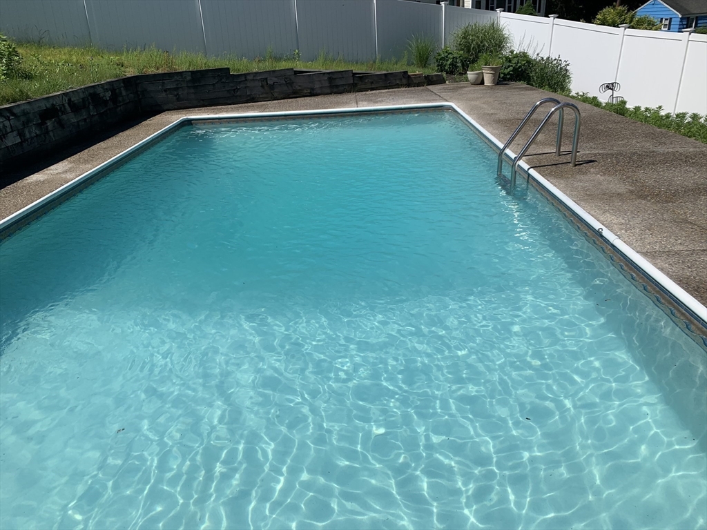8 Grace Road Woburn, MA 01801 - Photo 23 of 37 a view of swimming pool from a balcony