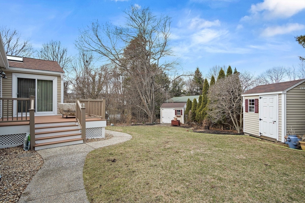 8 Grace Road Woburn, MA 01801 - Photo 28 of 37 a view of a house with backyard and sitting area