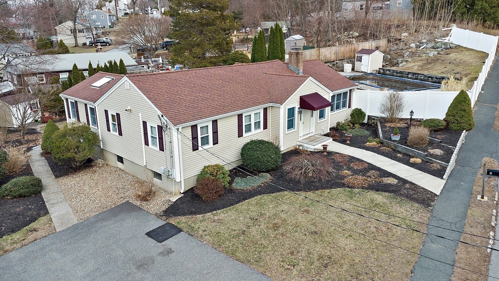 8 Grace Road Woburn, MA 01801 - Photo 36 of 37 a front view of a house with a yard