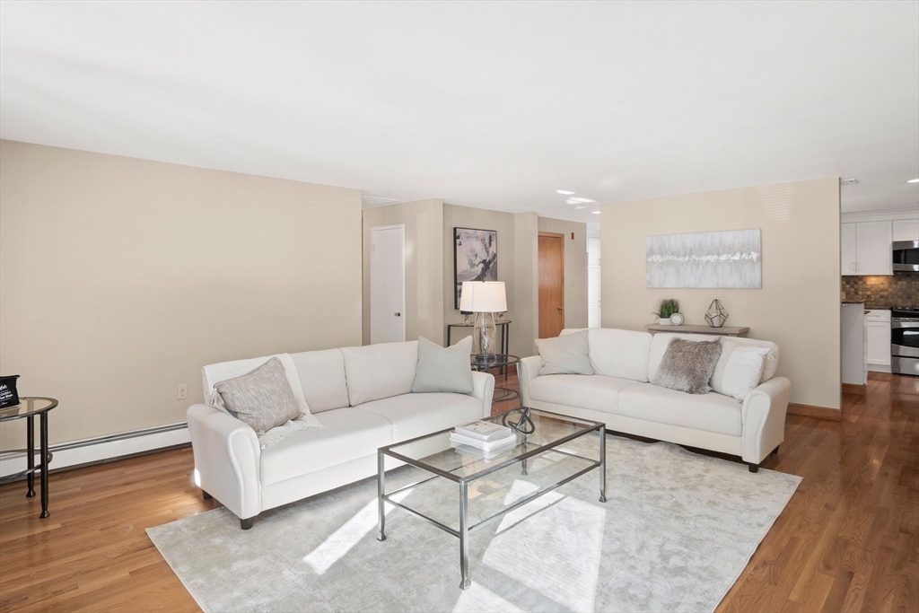 8 Grace Road Woburn, MA 01801 - Photo 5 of 37 a living room with furniture and a wooden floor