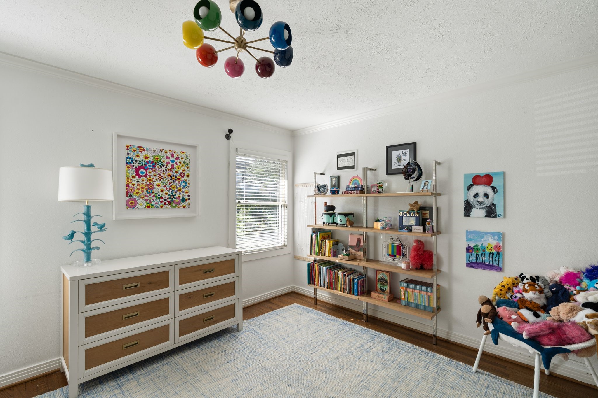 3914 Colquitt Street Houston, TX 77027 - Photo 16 of 36 Another view of the front secondary bedroom highlights the generous natural light from the windows and also shows the roomy layout and great wall space for furniture placement.