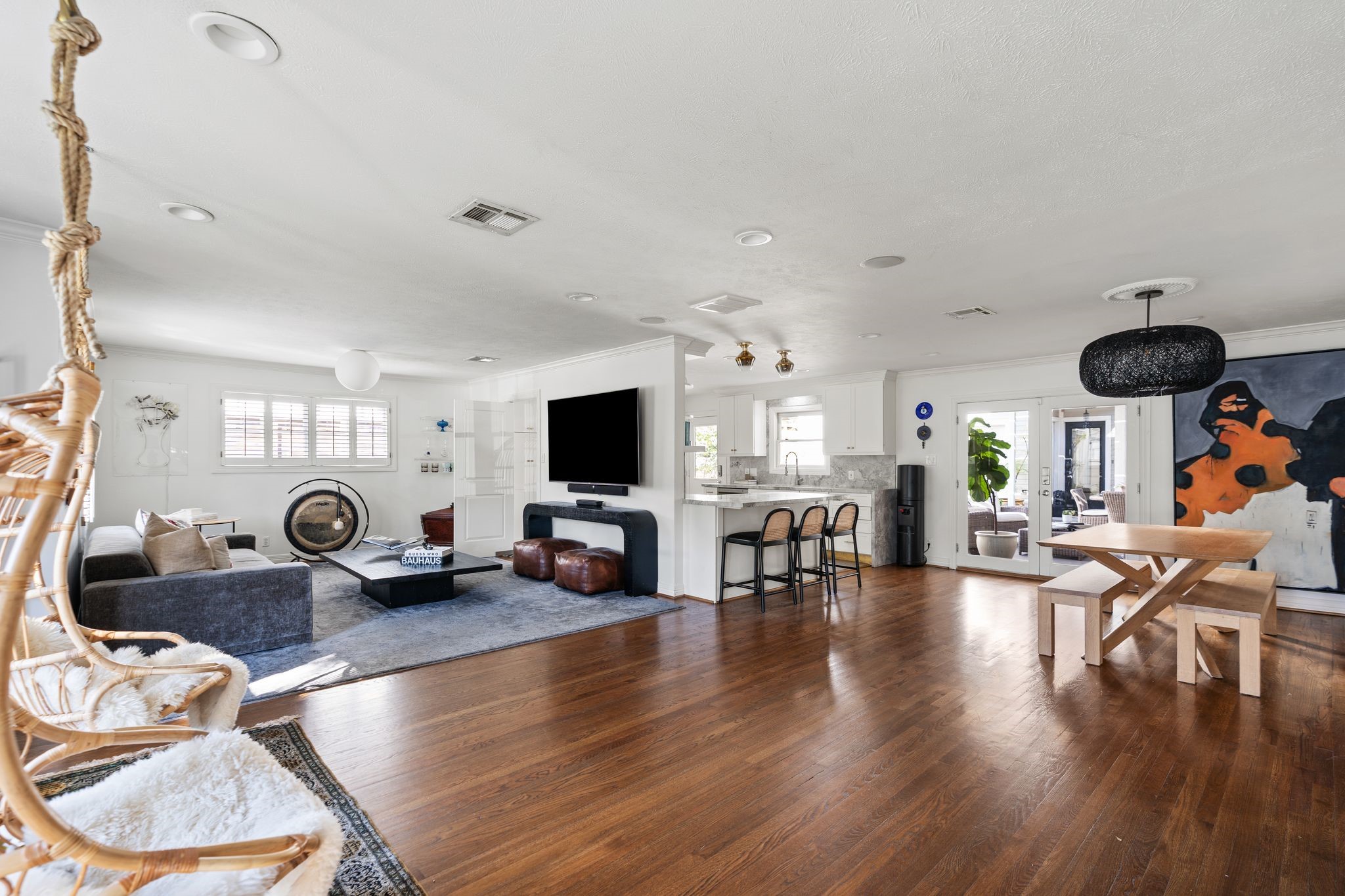 3914 Colquitt Street Houston, TX 77027 - Photo 36 of 36 From the moment you enter, the home welcomes you with a spacious, open floorplan featuring a generous entry, family room, dining area, and kitchen. The layout strikes the perfect balance—open yet thoughtfully defined—ideal for everyday living and effortless entertaining.