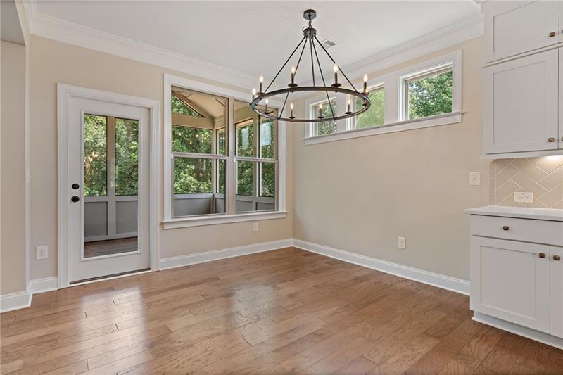 4105 Bellehurst Lane Cumming, GA 30040 - Photo 15 of 48 a view of room with window wooden floor and cabinet