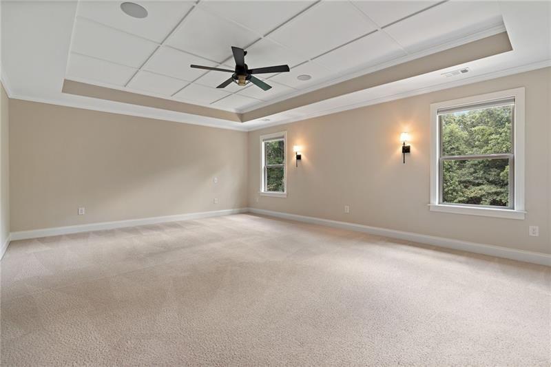 4105 Bellehurst Lane Cumming, GA 30040 - Photo 23 of 48 a view of a livingroom with a ceiling fan and window