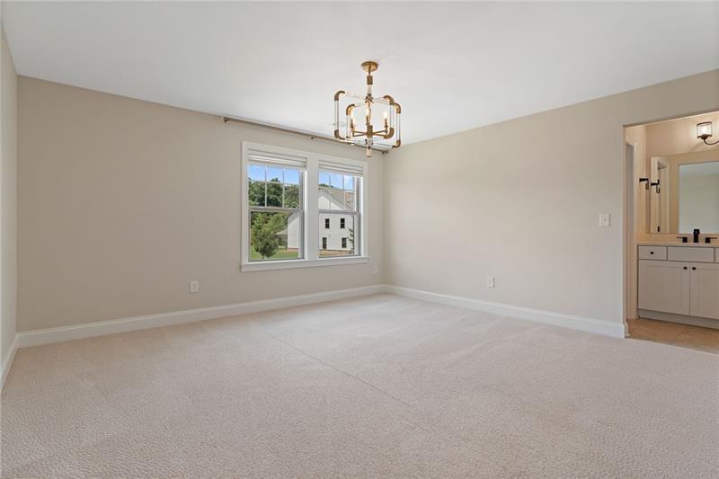 4105 Bellehurst Lane Cumming, GA 30040 - Photo 29 of 48 a view of an empty room with a window