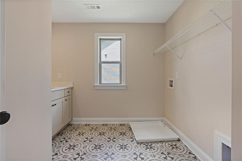 4105 Bellehurst Lane Cumming, GA 30040 - Photo 34 of 48 a bathroom with a sink toilet and vanity