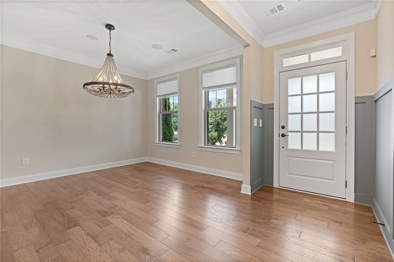 4105 Bellehurst Lane Cumming, GA 30040 - Photo 4 of 48 wooden floor in an empty room with a window