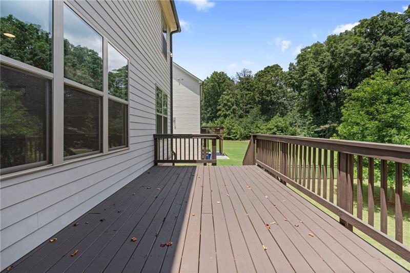 4105 Bellehurst Lane Cumming, GA 30040 - Photo 41 of 48 a view of balcony with wooden floor