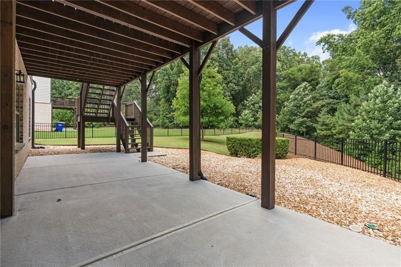 4105 Bellehurst Lane Cumming, GA 30040 - Photo 43 of 48 a view of porch with a backyard