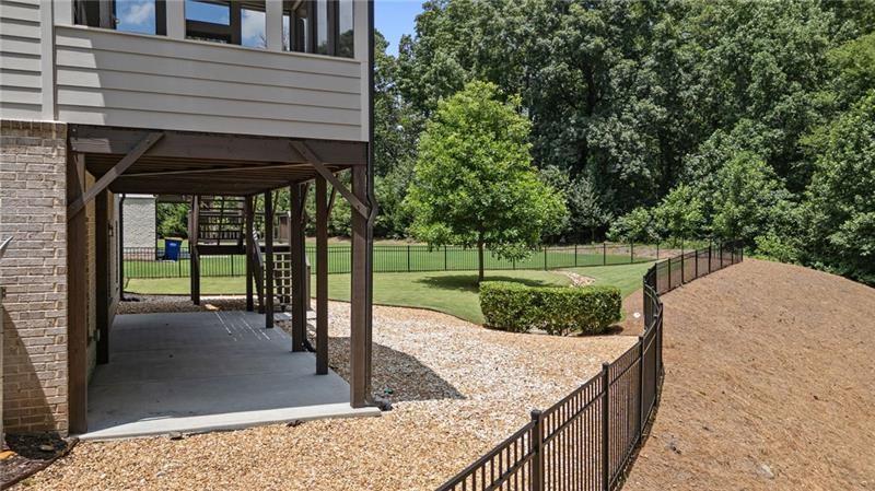 4105 Bellehurst Lane Cumming, GA 30040 - Photo 44 of 48 a view of a porch with a backyard