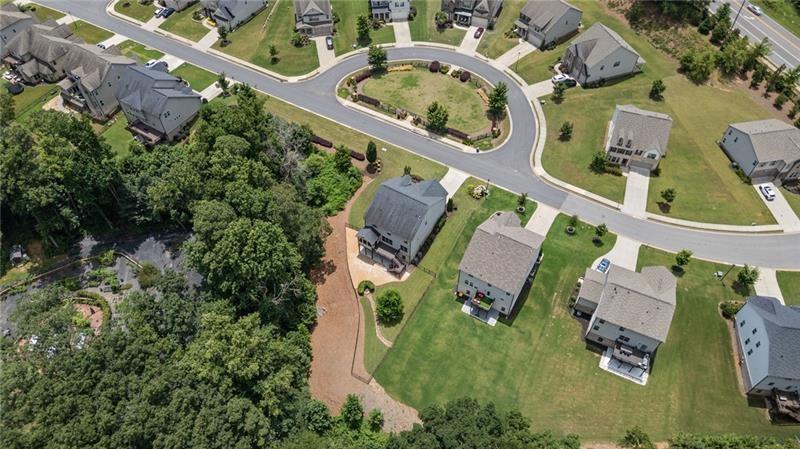 4105 Bellehurst Lane Cumming, GA 30040 - Photo 47 of 48 an aerial view of a house with garden space and street view