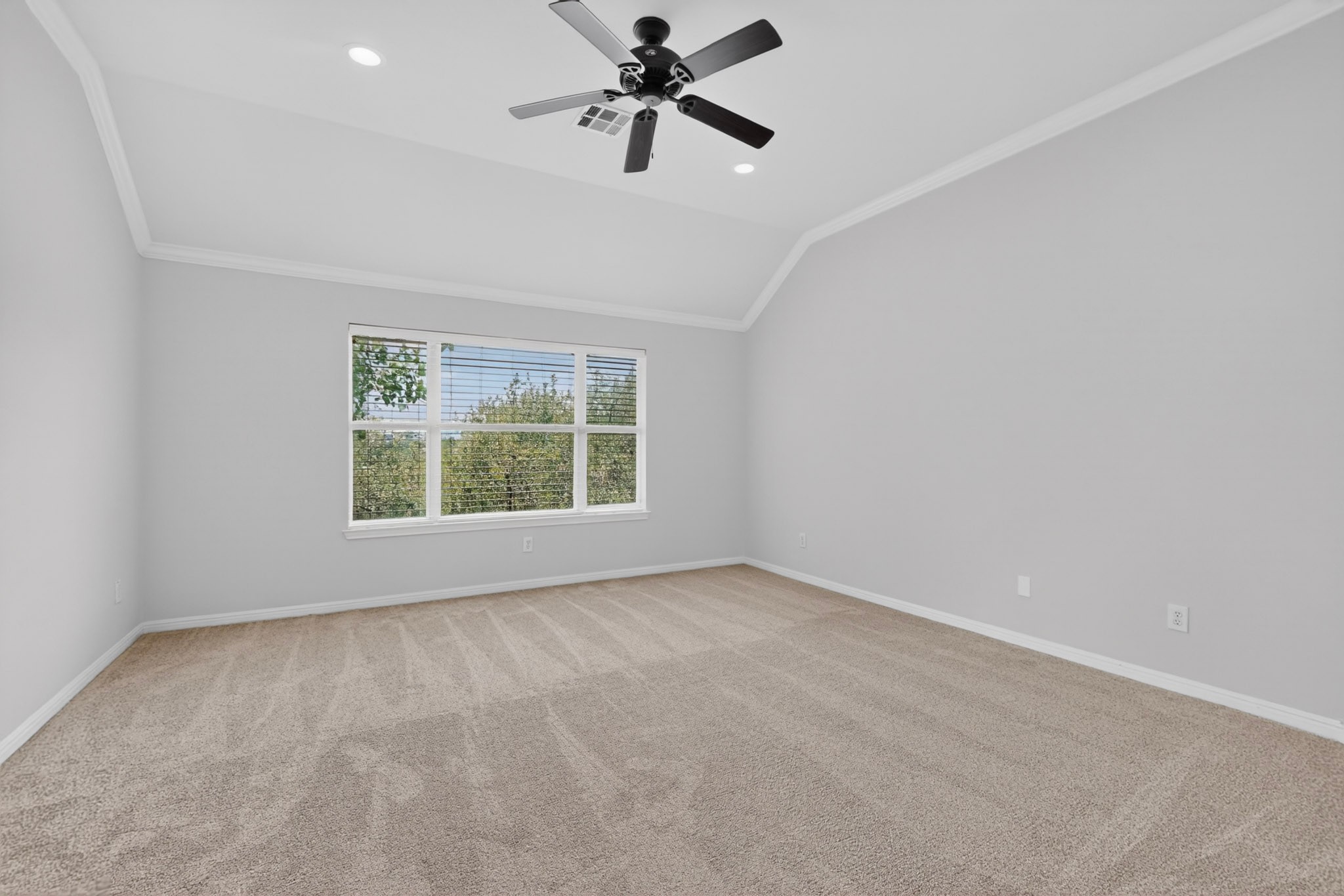 8617 Cobblestone Austin, TX 78735 - Photo 21 of 39 an empty room with a window and a fan