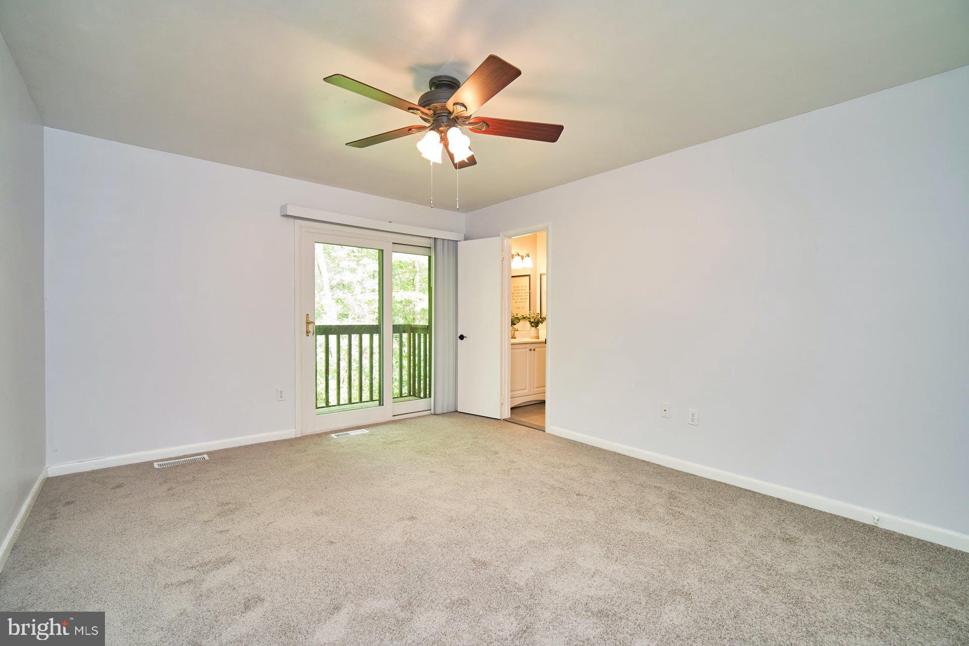 1944 Winterport Cluster Reston, VA 20191 - Photo 11 of 35 an empty room with windows and fan