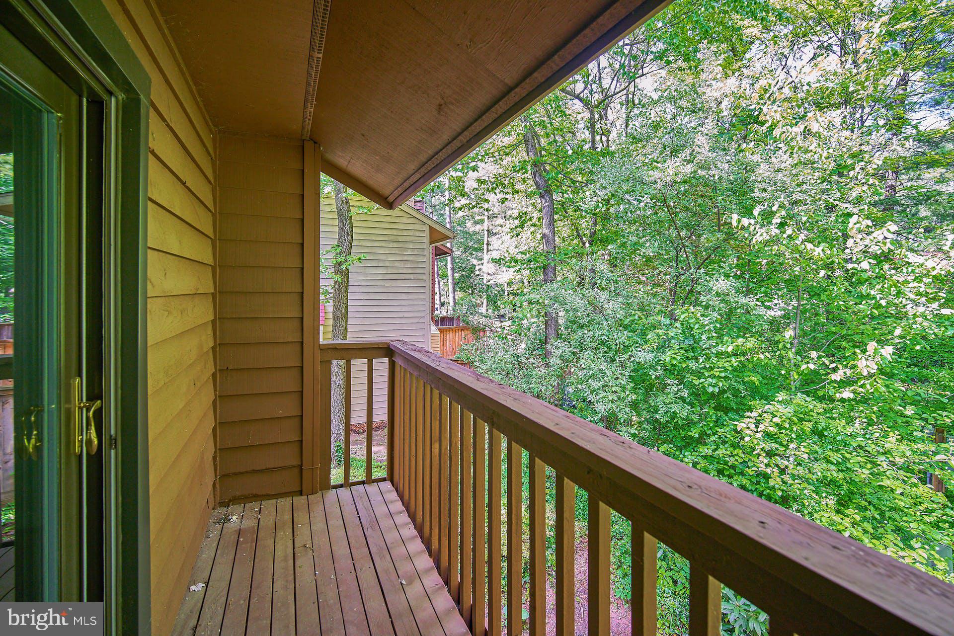 1944 Winterport Cluster Reston, VA 20191 - Photo 12 of 35 a view of a balcony with wooden floor