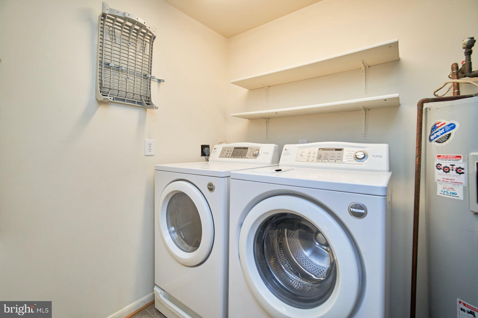 1944 Winterport Cluster Reston, VA 20191 - Photo 19 of 35 a utility room with dryer and washer