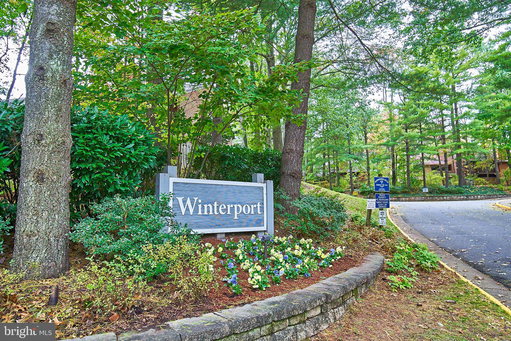 1944 Winterport Cluster Reston, VA 20191 - Photo 21 of 35 a sign on the side of the road