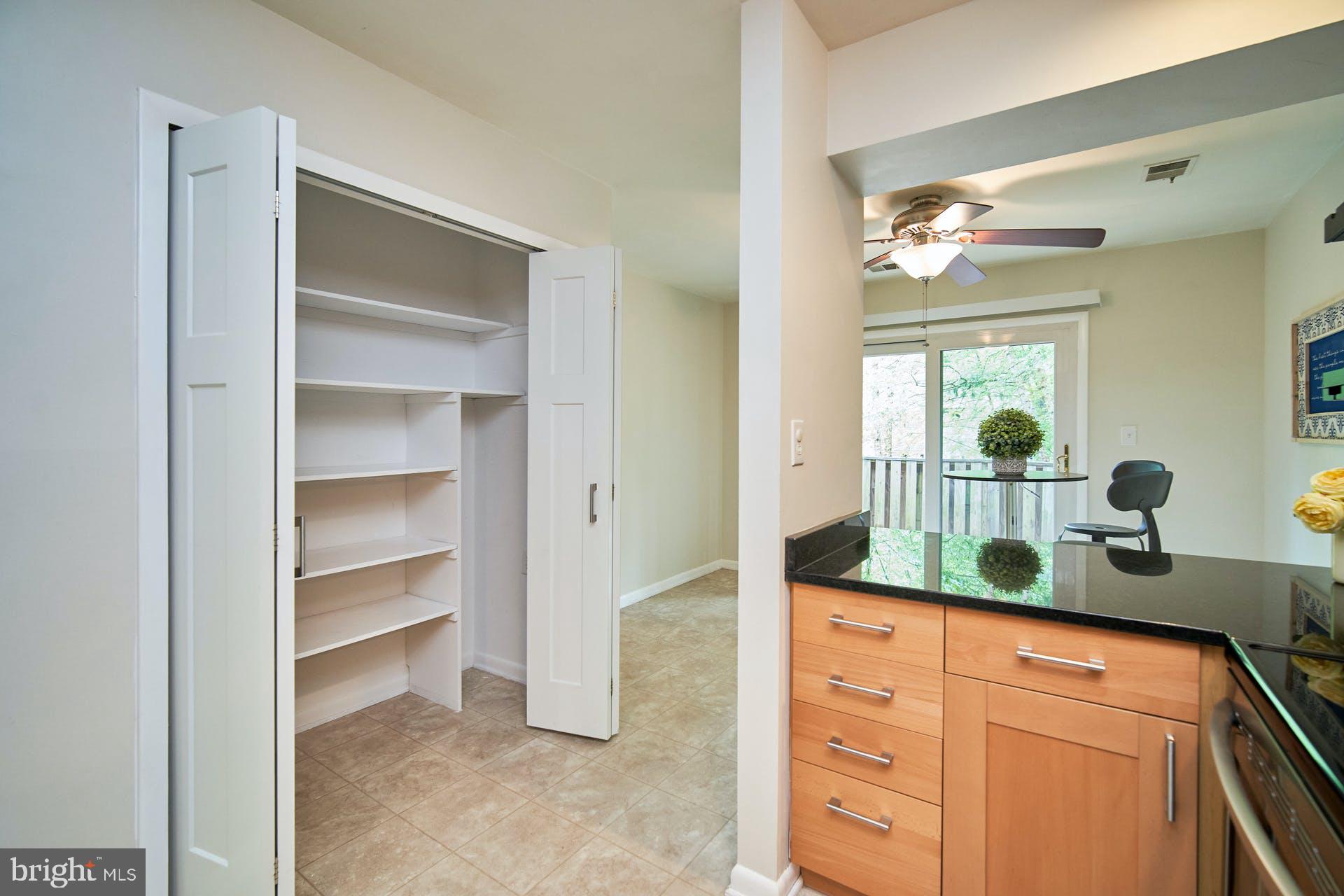 1944 Winterport Cluster Reston, VA 20191 - Photo 7 of 35 a bathroom with a granite countertop sink and a mirror