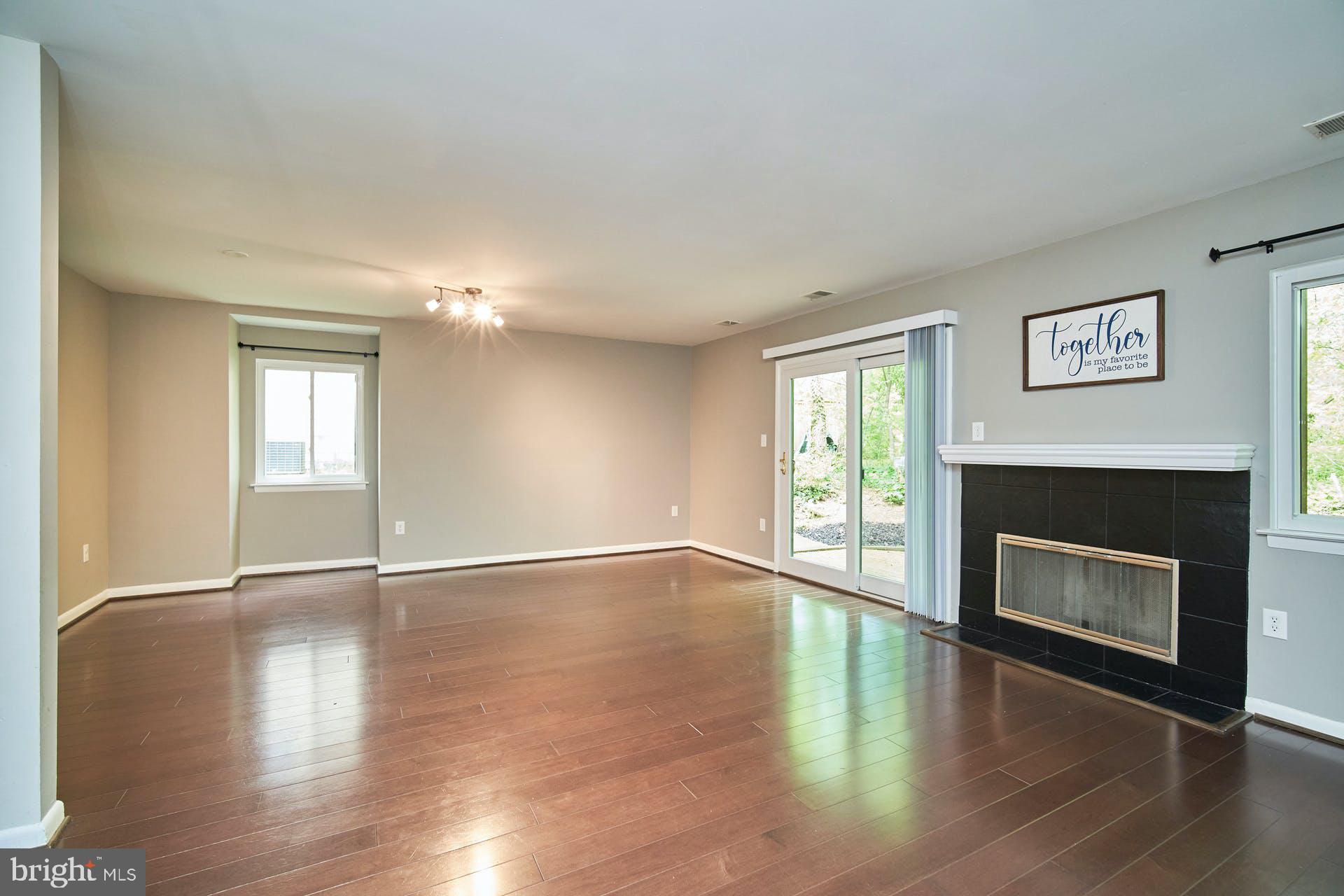 1944 Winterport Cluster Reston, VA 20191 - Photo 9 of 35 a view of an empty room with window and fire place