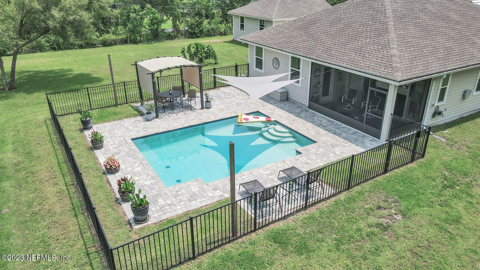 1521 Lee Road St. Johns, FL 32259 - Photo 29 of 38 an outdoor view of house with outdoor seating