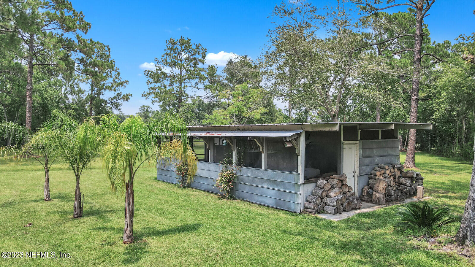 1521 Lee Road St. Johns, FL 32259 - Photo 34 of 38 a view of house with backyard