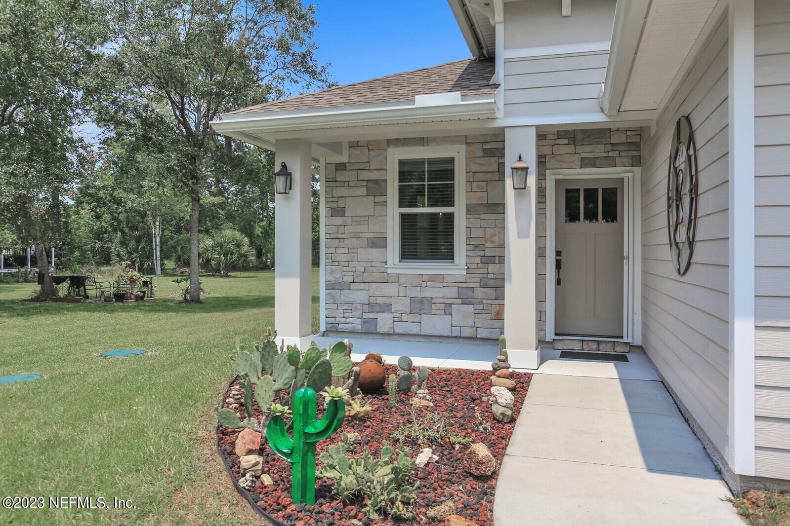 1521 Lee Road St. Johns, FL 32259 - Photo 4 of 38 a front view of a house with garden